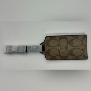 COACH Luggage Tag in signature canvas - Brown
